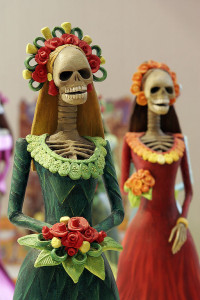 two catrina figurines